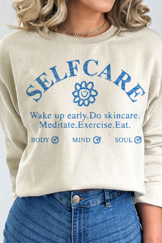 SELF CARE GRAPHIC SWEATSHIRT