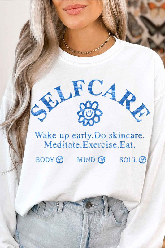 SELF CARE GRAPHIC SWEATSHIRT