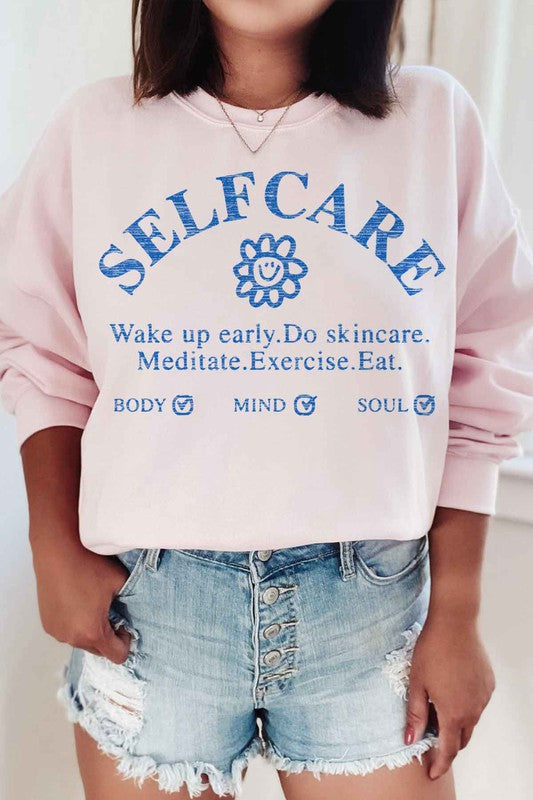 SELF CARE GRAPHIC SWEATSHIRT